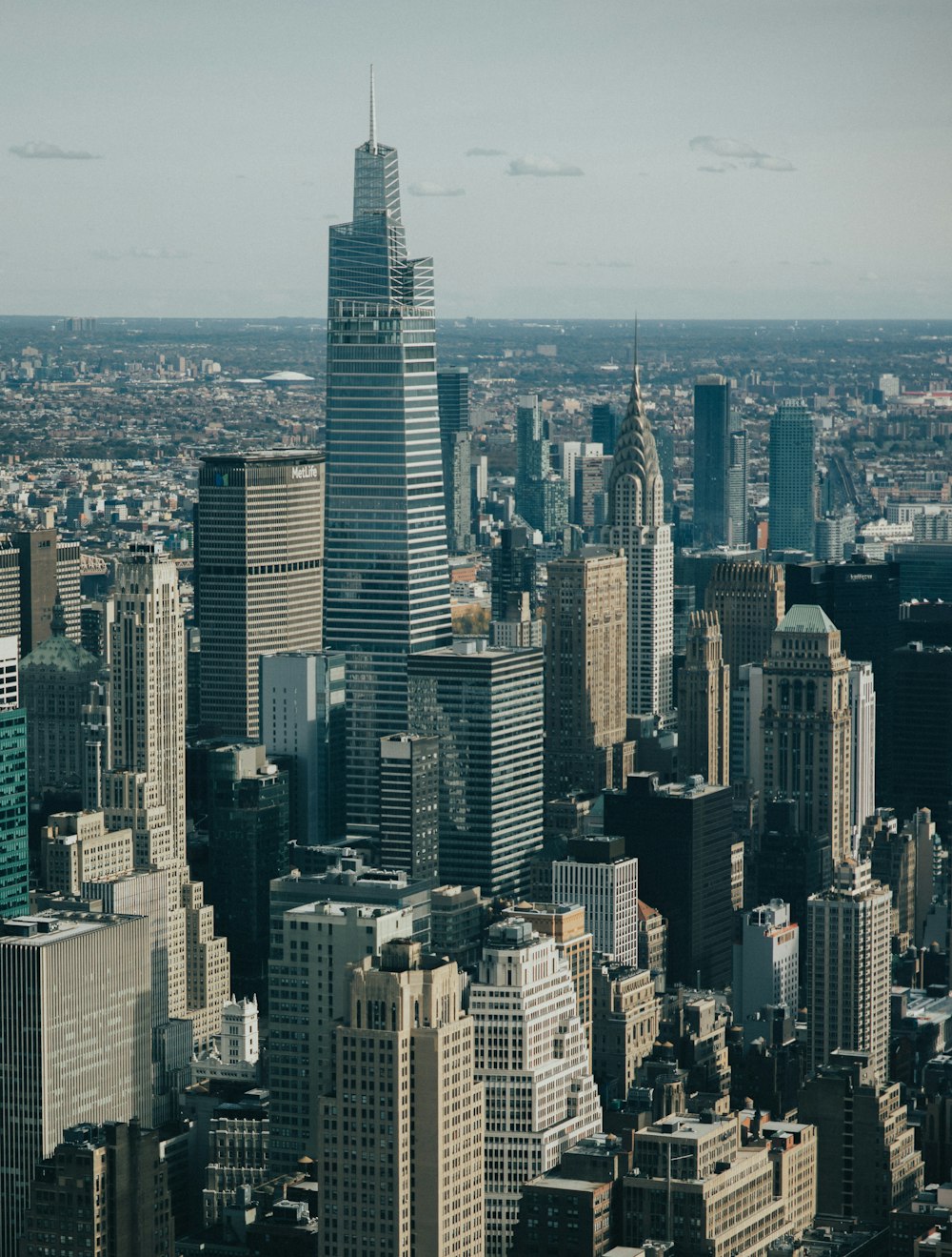 a view of a large city with tall buildings