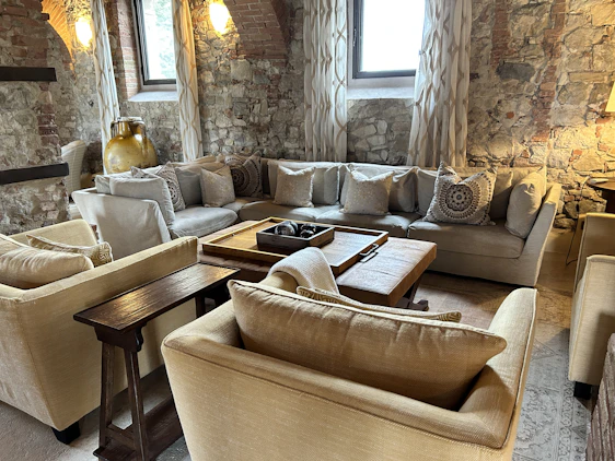 Cozy living room corner with terracotta accents and soft natural light highlighting handcrafted brick home decor.