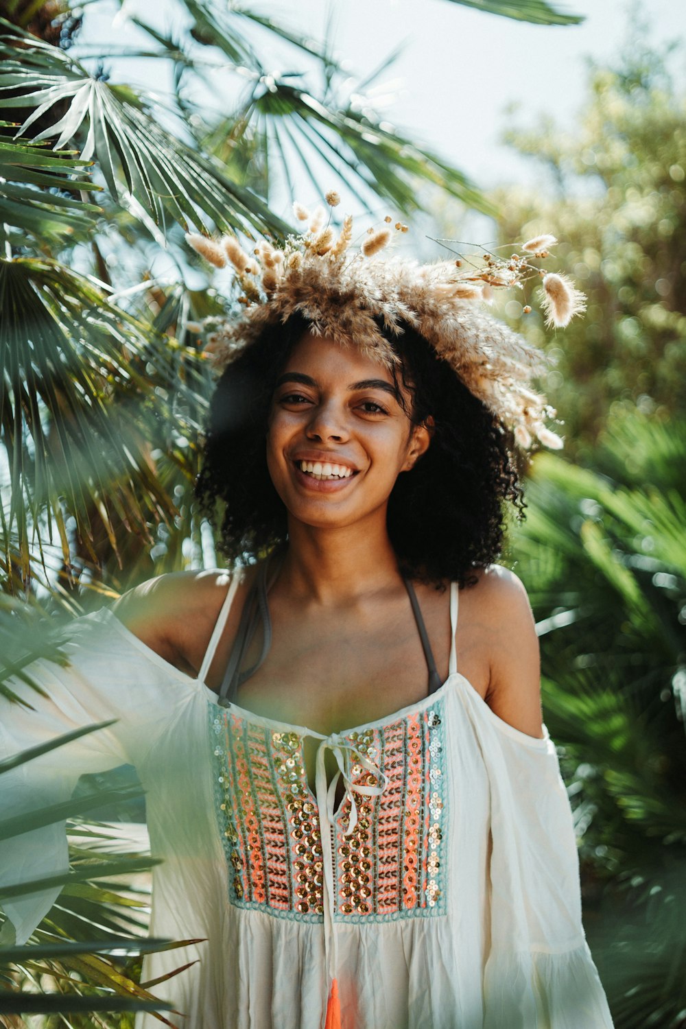 a woman with a flower crown on her head