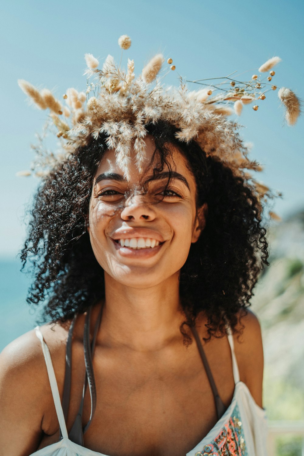 a woman with a flower crown on her head