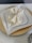 A stylish table setting featuring plates from Topchoice Industries.