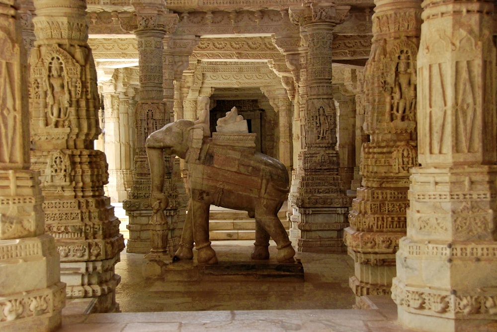 a statue of an elephant in a temple