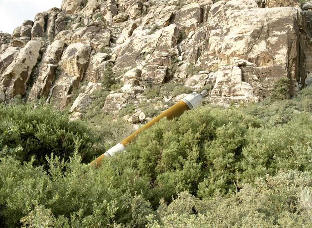 a satellite crashed on a rocky hillside