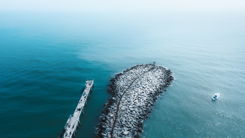 an aerial view of a boat in the water