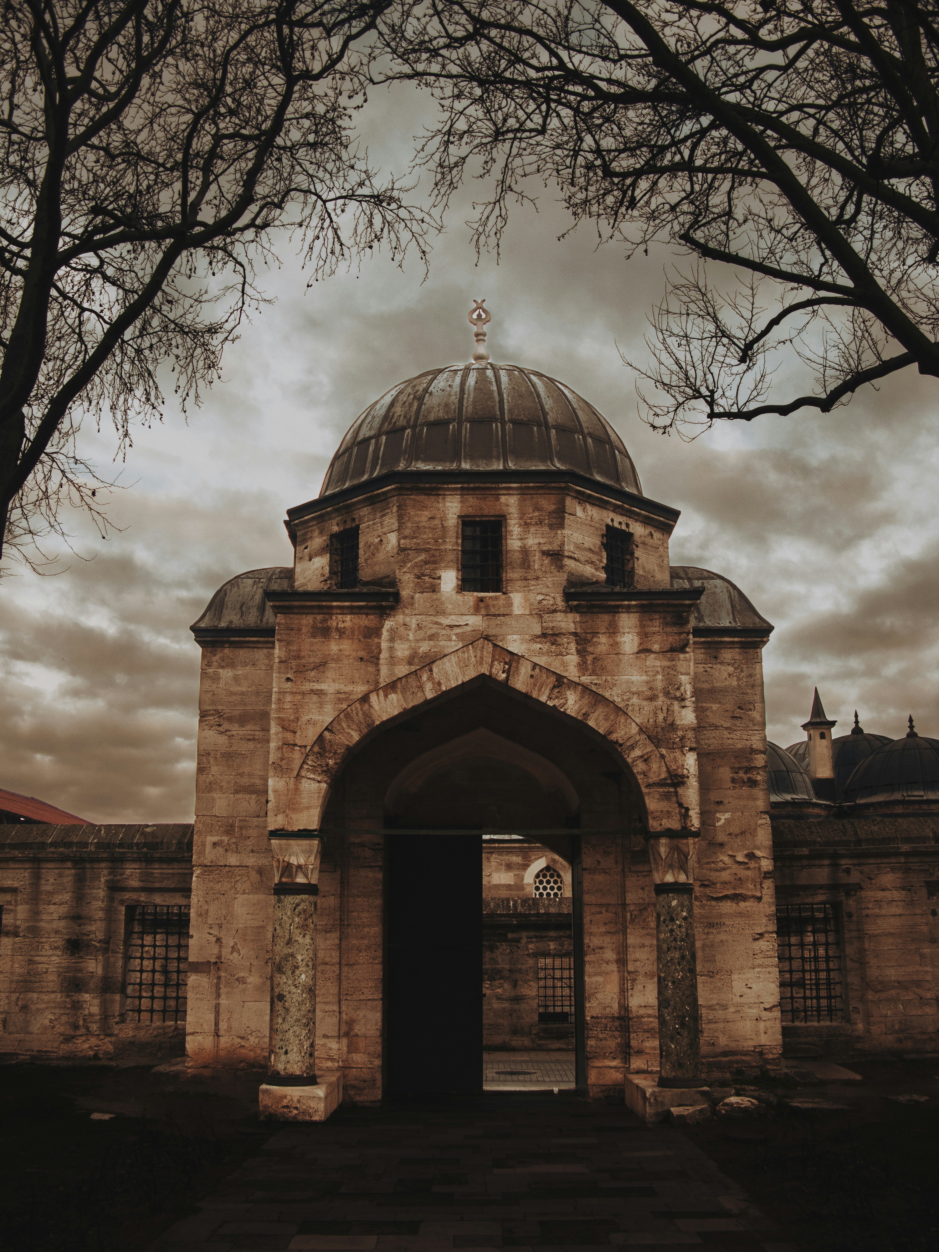 an old building with a dome on top of it