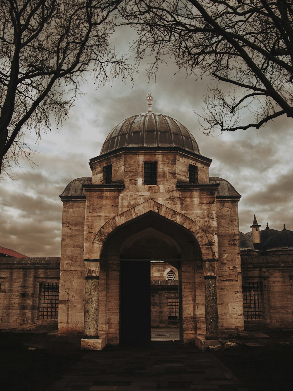 an old building with a dome on top of it