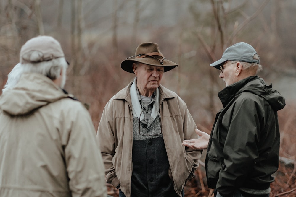 a group of men standing next to each other