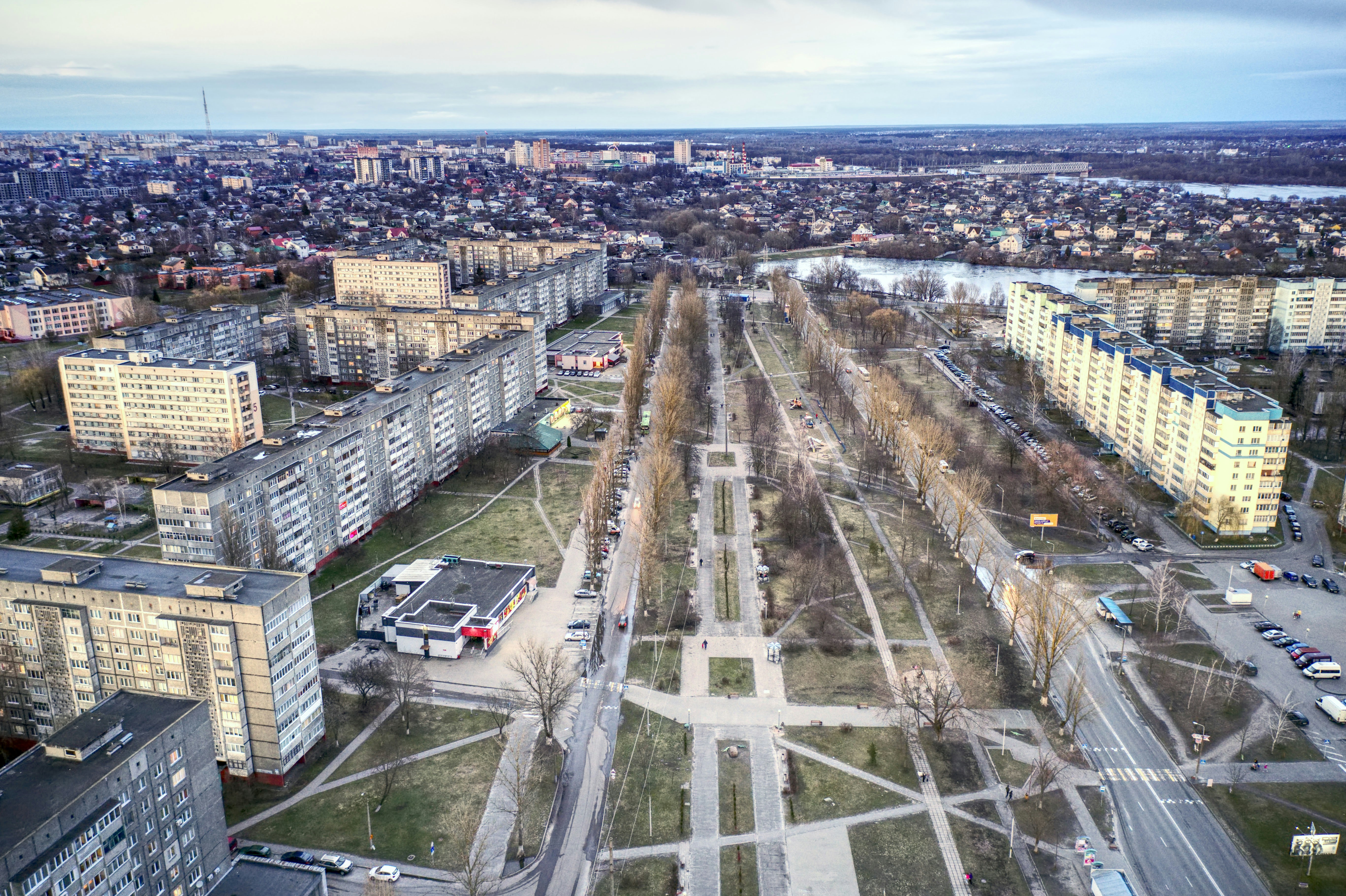 an aerial view of a city with lots of tall buildings