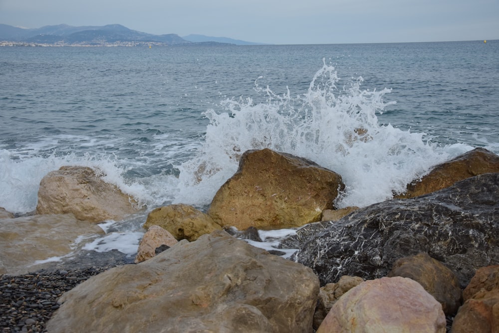 a large body of water surrounded by rocks