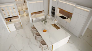 Spacious kitchen island with marble countertop and elegant pendant lights