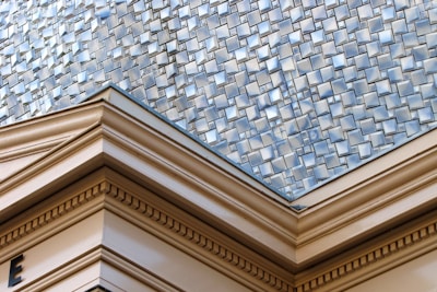 a close up of a building with a clock on it