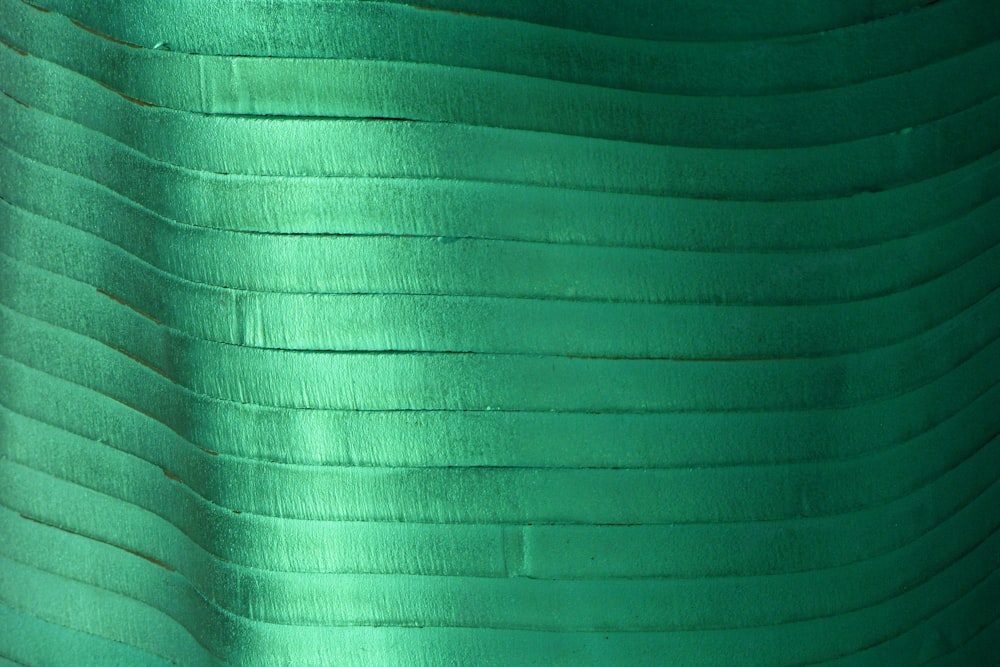 a close up view of a green fabric