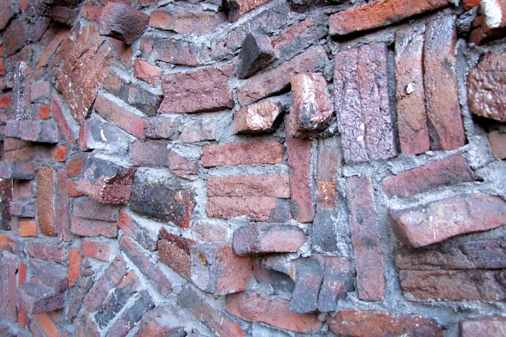 a close up of a brick wall made of bricks