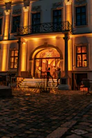 The exterior of Cantine del Frida at sunset, showcasing its charming and vibrant facade.