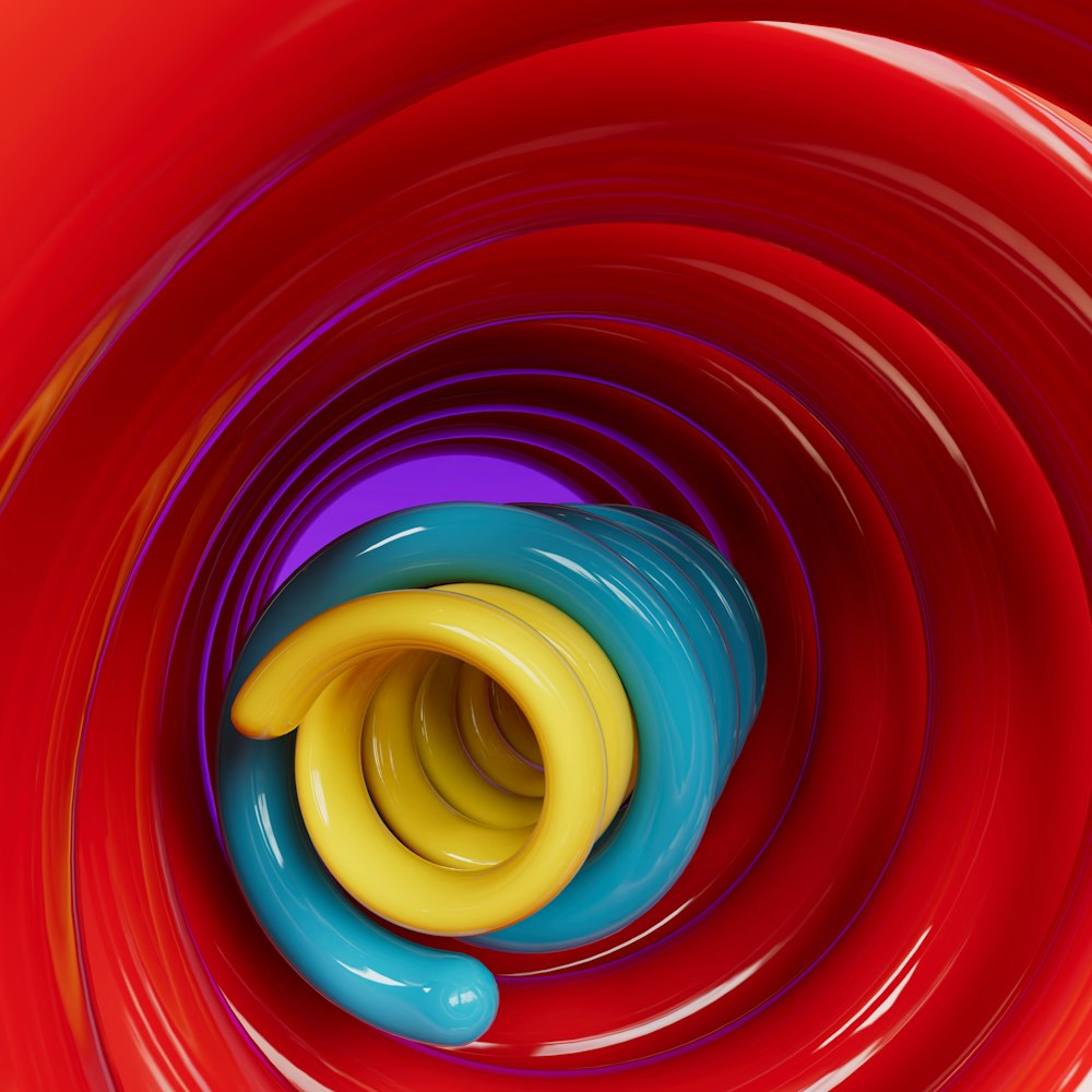 Un objet rouge et bleu avec un objet jaune au centre photo – Photo Bobine  Gratuite sur Unsplash
