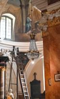 a chandelier hanging from the ceiling of a building