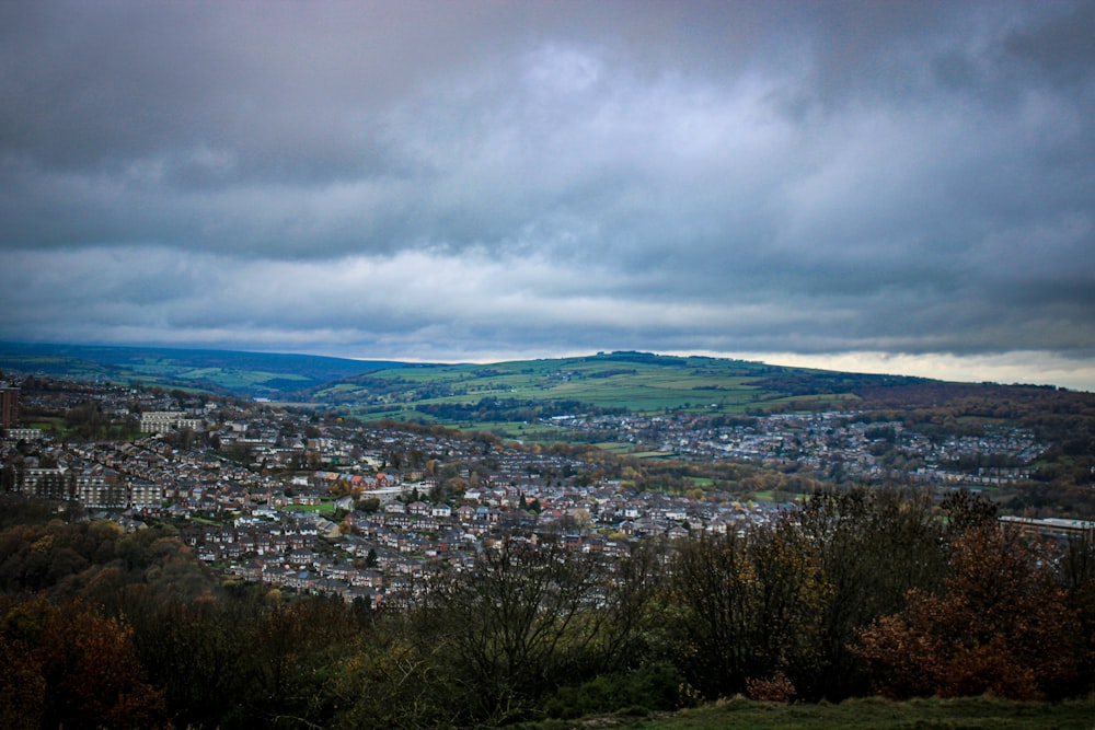 a view of a city from the top of a hill