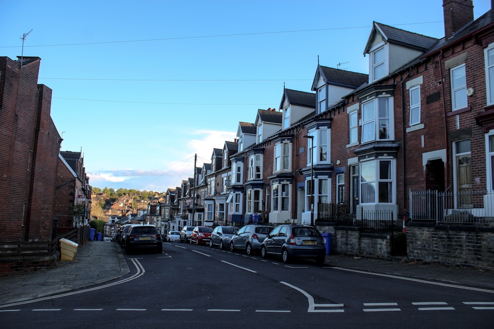 a street with cars parked on both sides of it