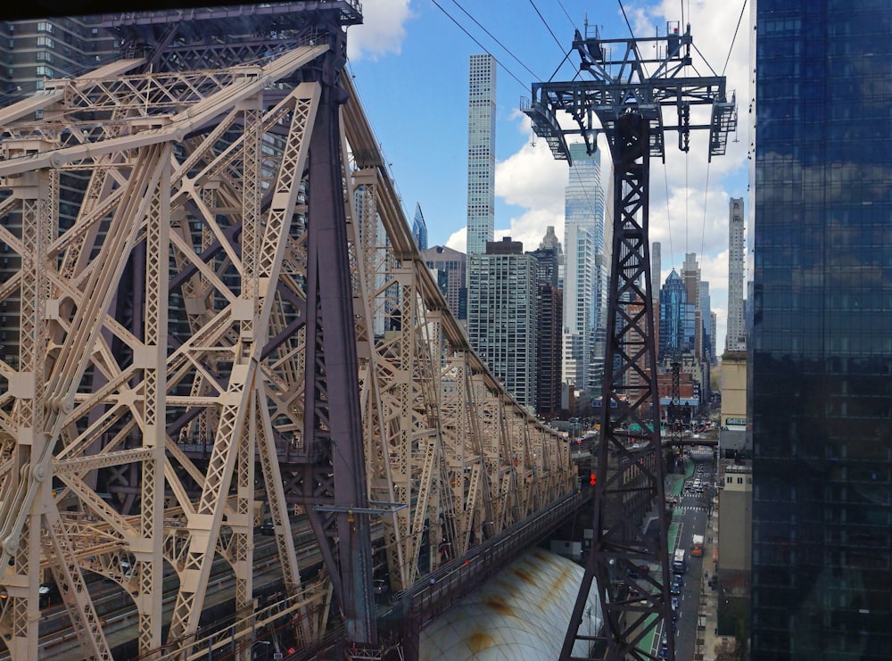 a view of a city from the top of a bridge