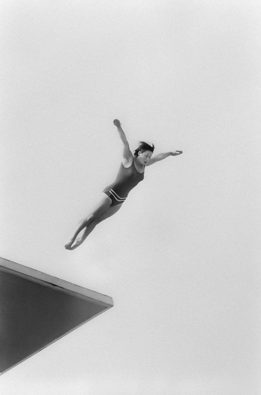 a person jumping into the air on a surfboard