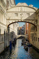 The iconic canals of Venice with gondolas gliding under historic bridges