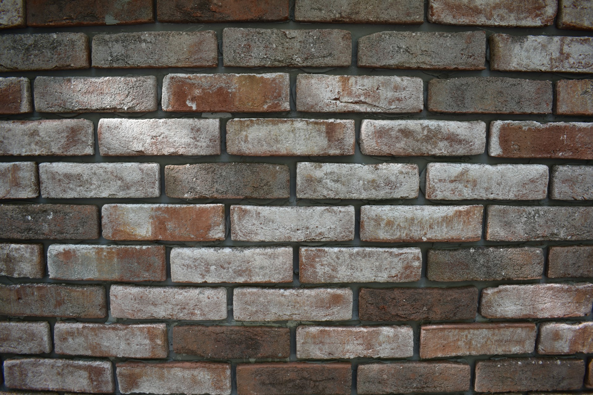 a close up of a brick wall made of bricks