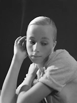 A thoughtful moment as someone prepares to make a confident approach.