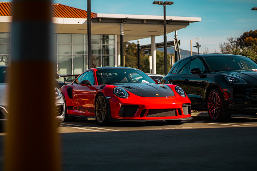 a couple of cars parked in a parking lot