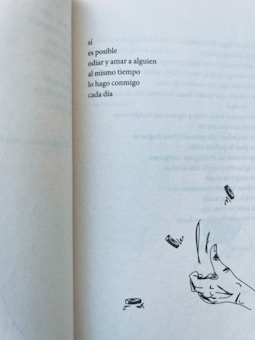 A page from a book with text in Spanish expressing a profound thought about the coexistence of love and hate towards oneself. There is an illustration of a hand tossing coins in the air, suggesting movement.