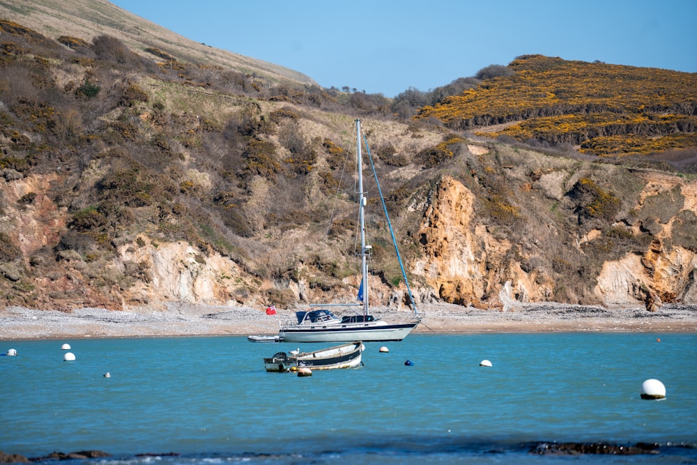 a boat floating on top of a body of water