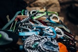 A vibrant lifestyle photo showing gear packed for an early morning climb against a lush green backdrop.