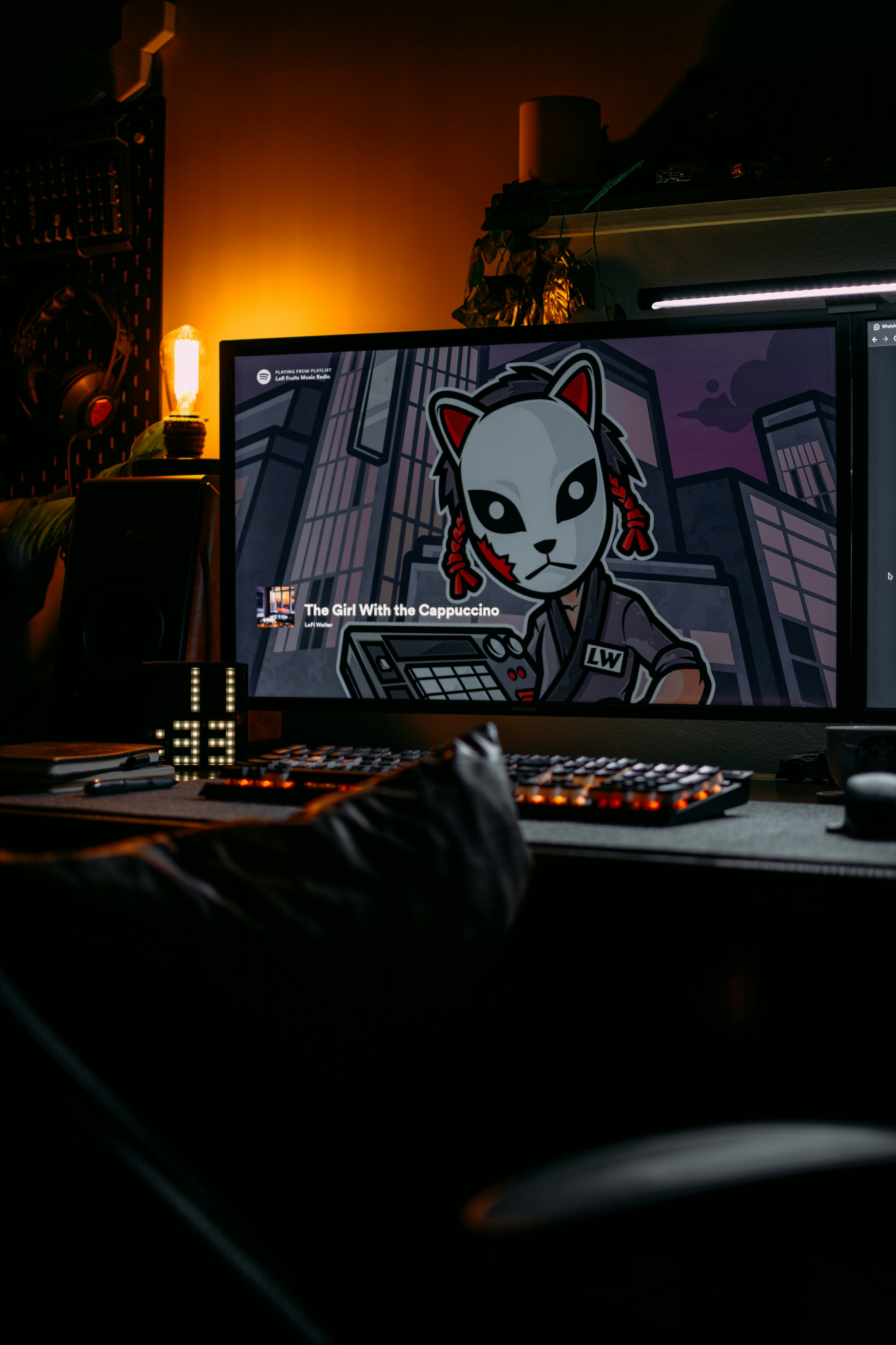 a computer monitor sitting on top of a desk