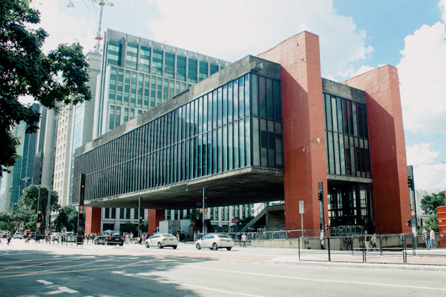The distinctive red supports and suspended glass galleries of MASP on Avenida Paulista, Sao Paulo