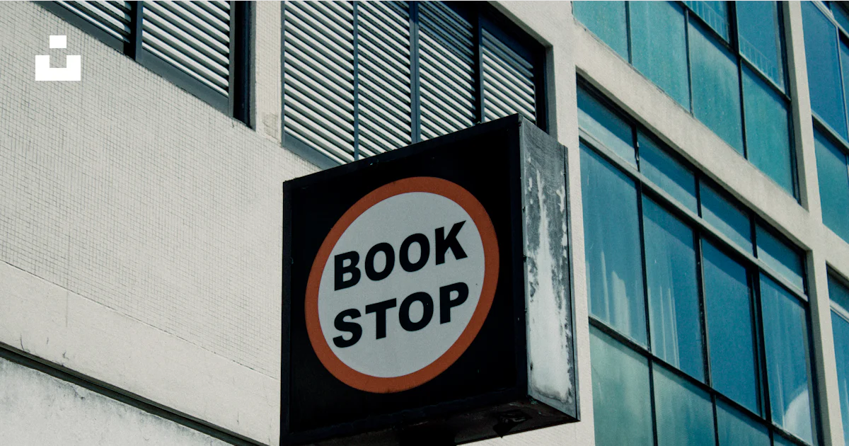 A book stop sign in front of a building photo – Free Brazil Image on ...