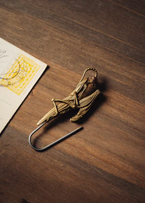 Close-up of a shiny vintage card being carefully examined by a collector.