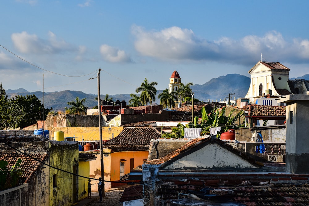 a view of a city with mountains in the background