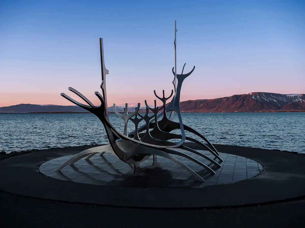The Sun Voyager sculpture beside the sea in Reykjavík at dusk
