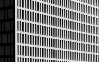 a tall building with a clock on the side of it