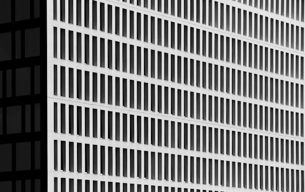 a tall building with a clock on the side of it