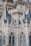 Detailed architectural design featuring intricate spires, ornate patterns, and neo-gothic elements with blue-tiled roofs and pointed arches.