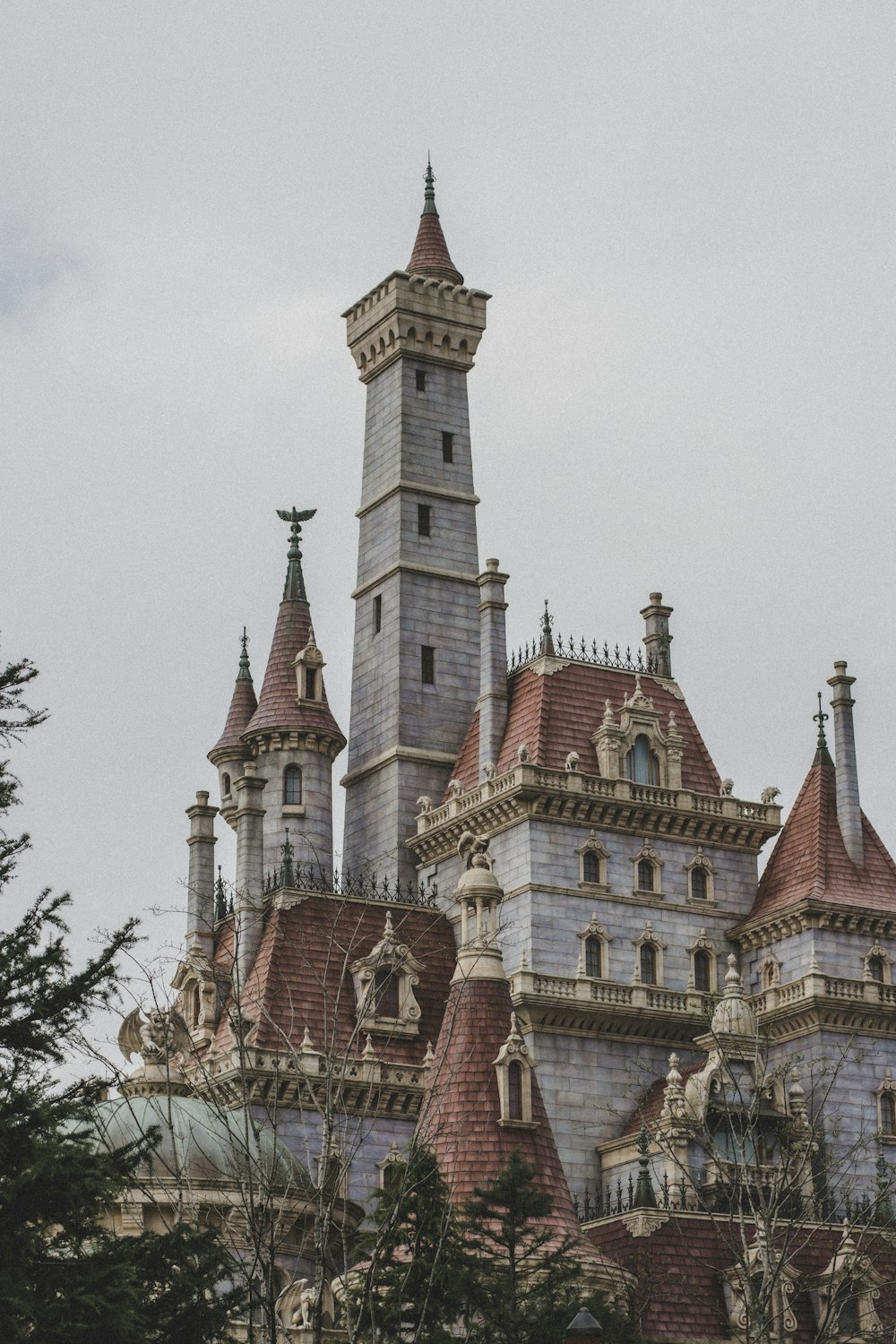 a very tall building with a clock on it's side