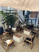 An outdoor area with PVC mats arranged for relaxation.