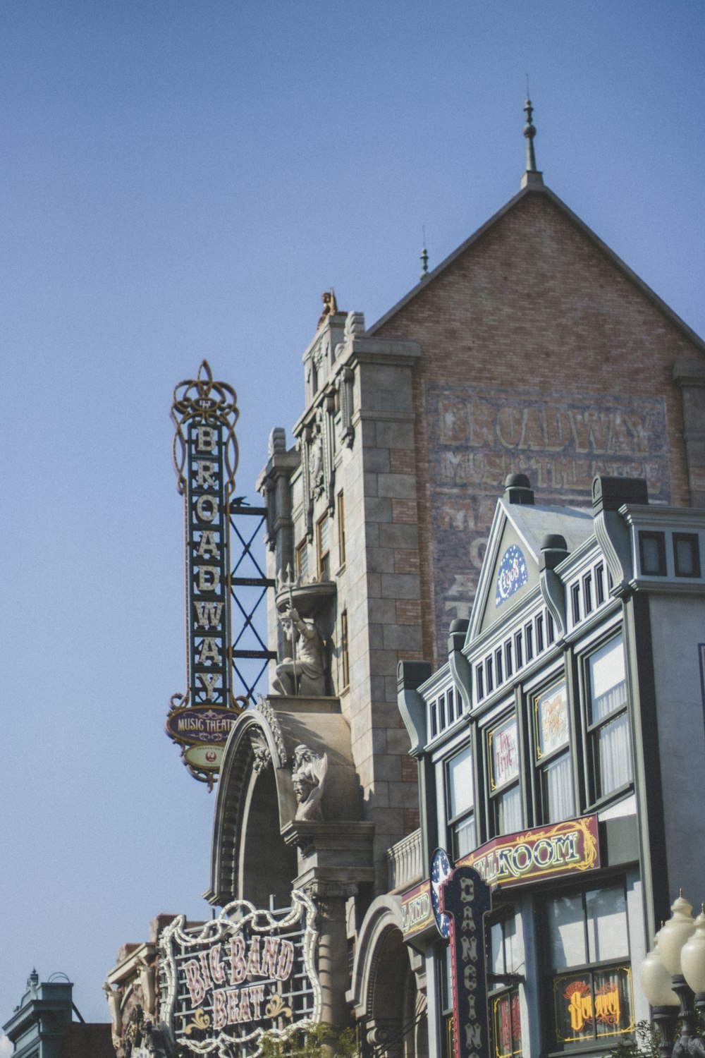 a large building with a clock on the top of it