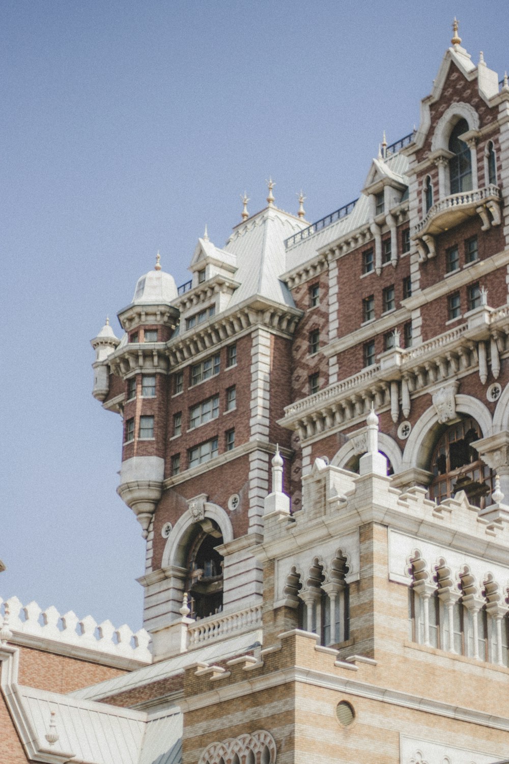 a large building with a clock on the front of it