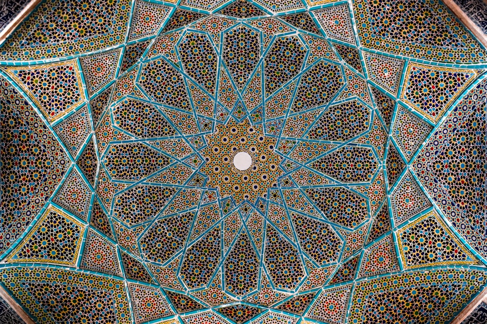 a close up view of a decorative ceiling in a building
