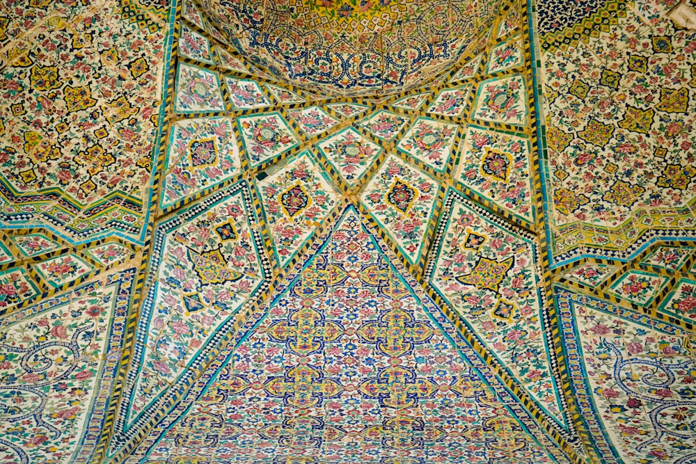 an intricately decorated ceiling in a building