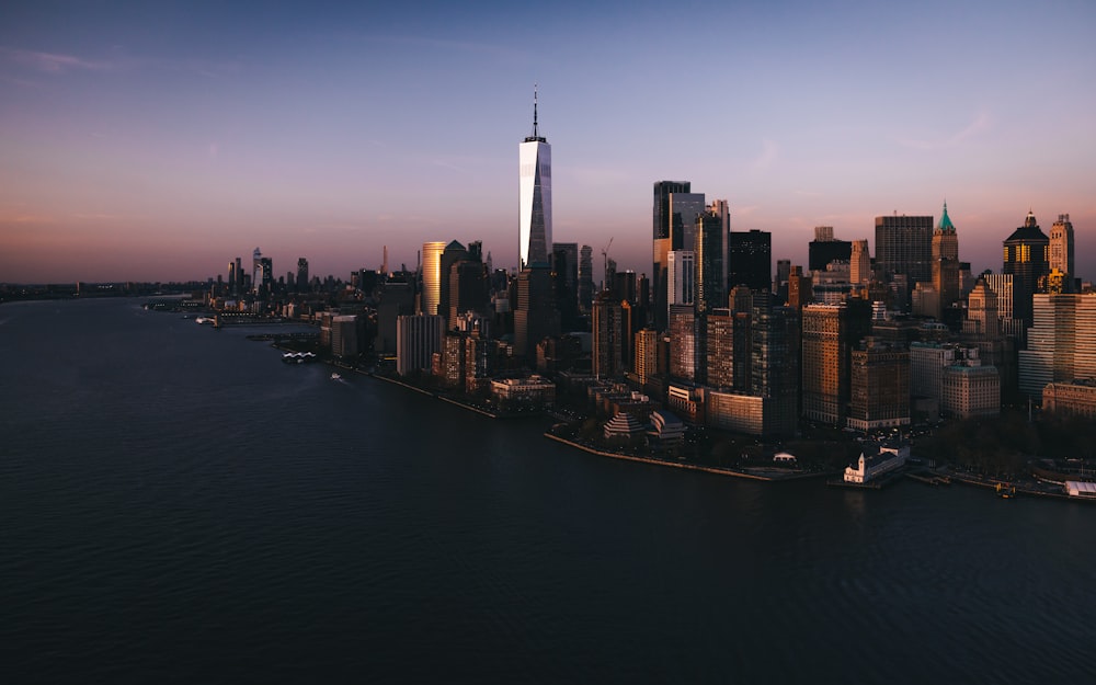 an aerial view of a city at sunset