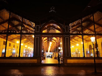 A welcoming entrance of Rockfort Hall bathed in warm evening light, inviting visitors inside.