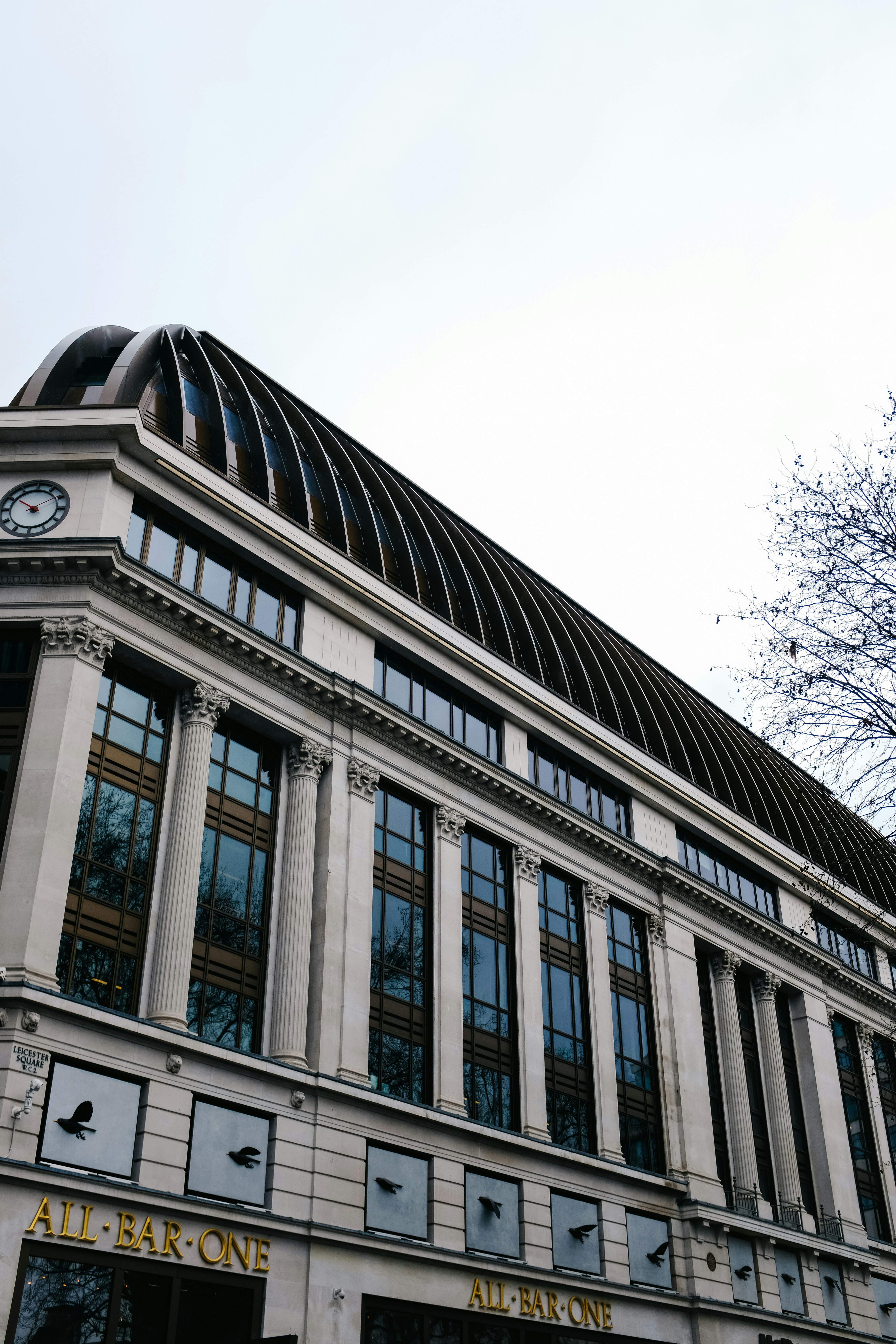 a large building with a clock on the top of it