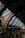 An intricately designed interior featuring arched ceilings and skylights in a historic building. The architecture showcases detailed brickwork, ornamental patterns, and large windows that allow natural light to illuminate the space.